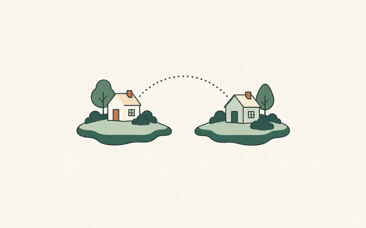 Two small islands, each with a house, joined by a dotted arc.