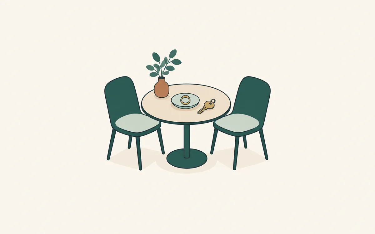 A table for two with a single ring in a dish and one house key.